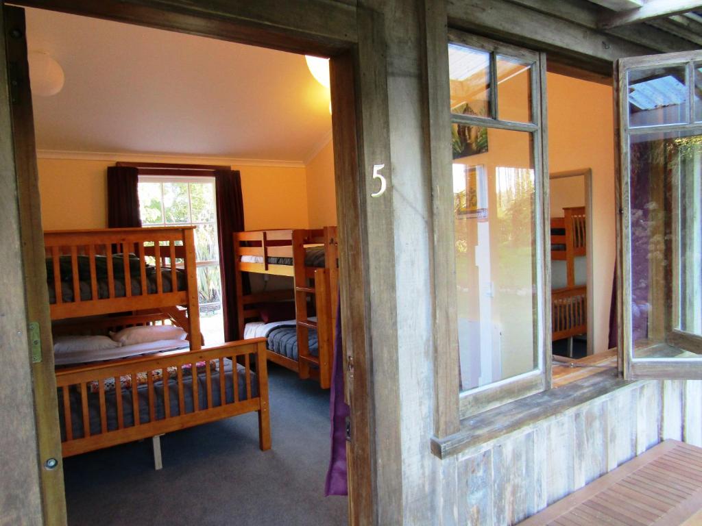 Postel nebo postele na pokoji v ubytování Greenstone Retreat