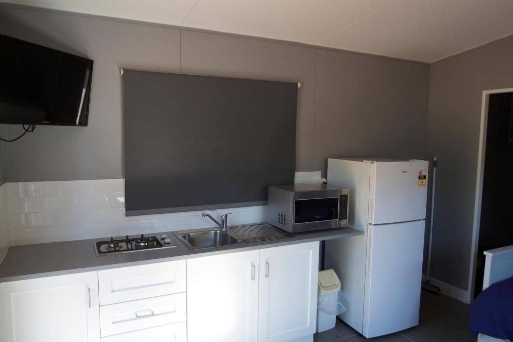 Kuchyň nebo kuchyňský kout v ubytování Yandina Caravan Park