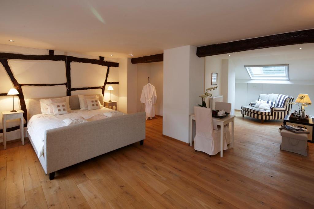 Postel nebo postele na pokoji v ubytování B&B Hof van Vervoering