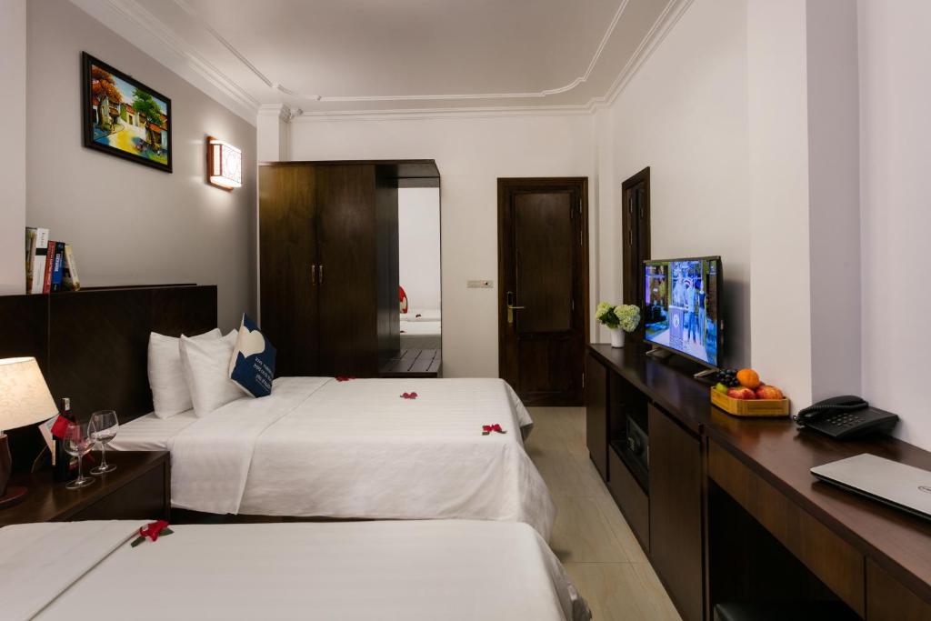 TV a/nebo společenská místnost v ubytování Hanoi Stella Hotel