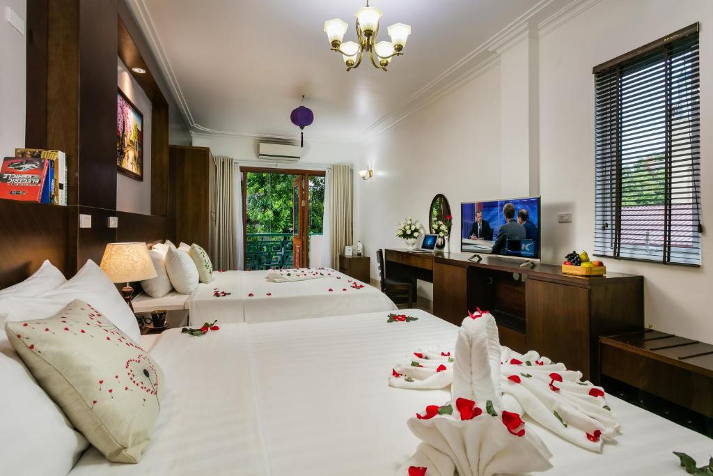 TV a/nebo společenská místnost v ubytování Hanoi Stella Hotel