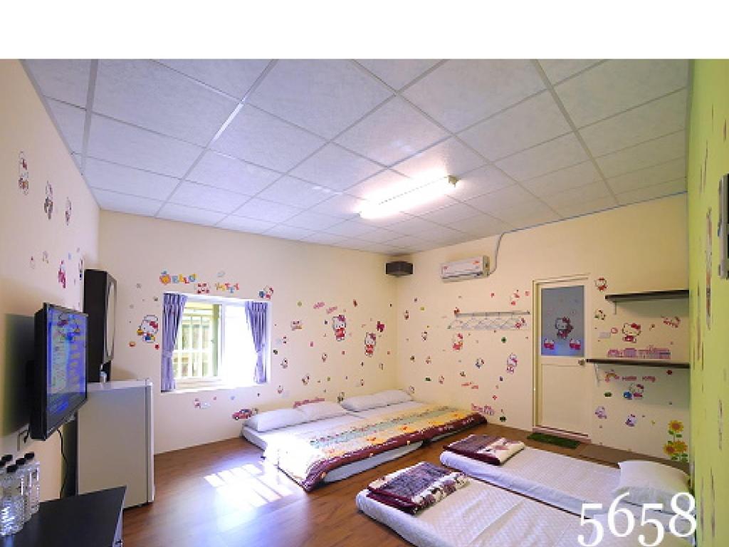 Postel nebo postele na pokoji v ubytování Hua Qiao De Jia