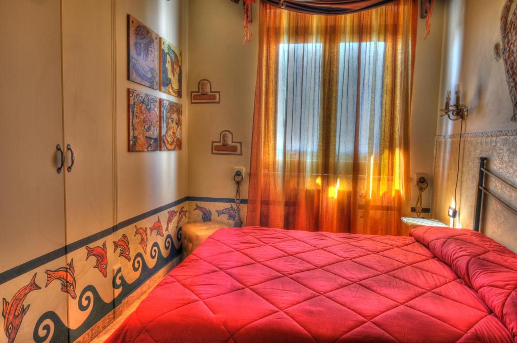 Postel nebo postele na pokoji v ubytování Guest House Qui Dormì L'Etrusco