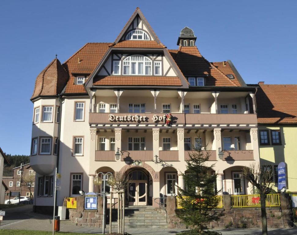 a building in the center of a city at Amadeus Boutique Hotel Deutscher Hof in Georgenthal