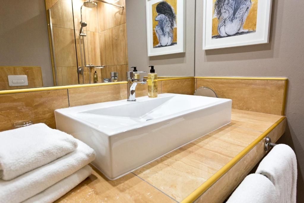Ванная комната в Hotel Kalura