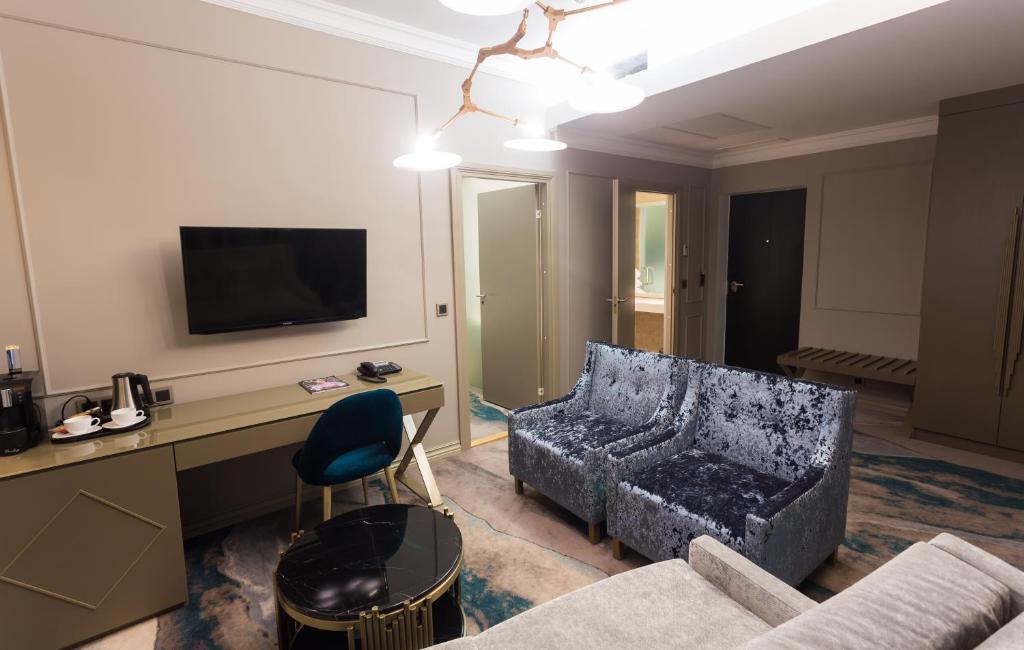TV a/nebo společenská místnost v ubytování Aqva Hotel & Spa