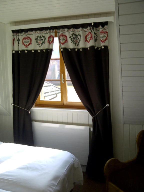 Voodi või voodid majutusasutuse Hotel de la Lande toas