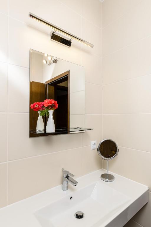 Koupelna v ubytování AKZENT Hotel Meerfräulein