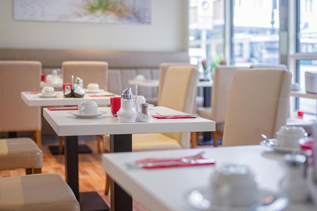 Restaurace v ubytování Hotel am Kieler Schloss by Première Classe