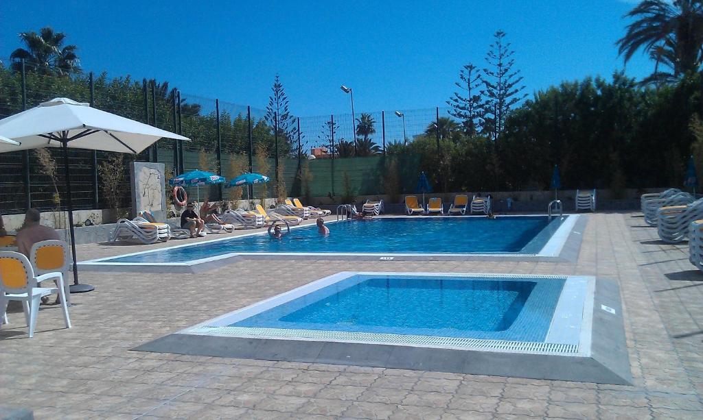 Bazén v ubytování Bungalows Rebecca Park nebo v jeho okolí