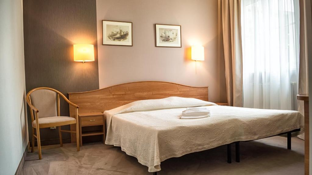 Postel nebo postele na pokoji v ubytování Hotel Gaja