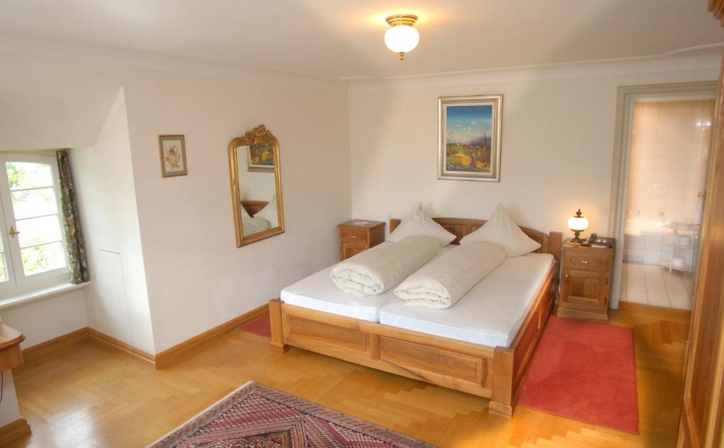 Postel nebo postele na pokoji v ubytování Hotel Gasthof Löwen