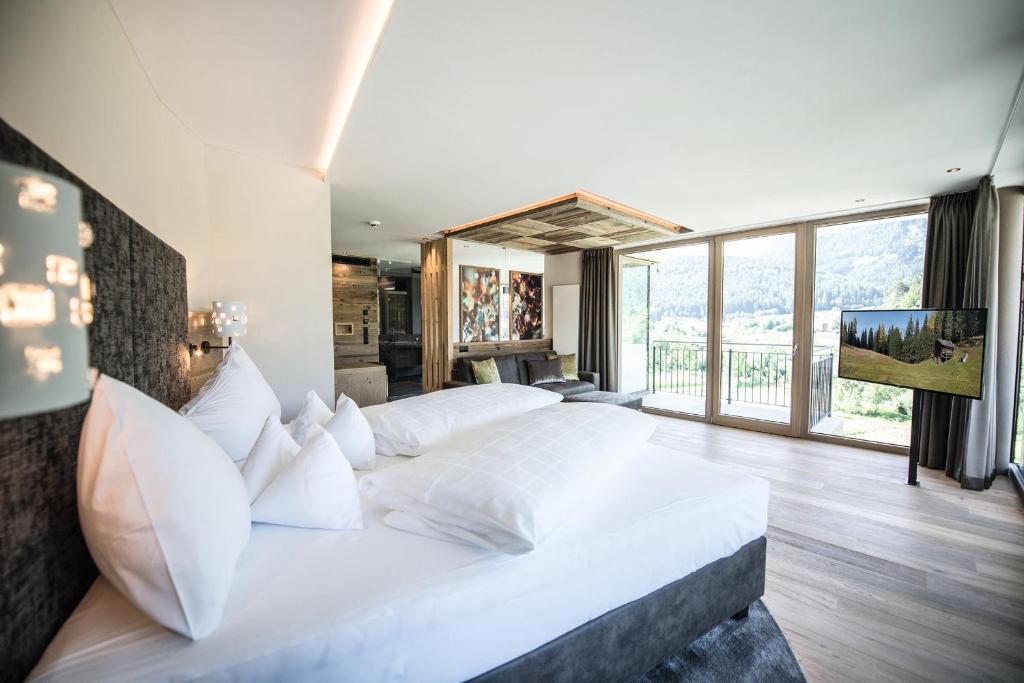 Postel nebo postele na pokoji v ubytování Hotel Kronblick