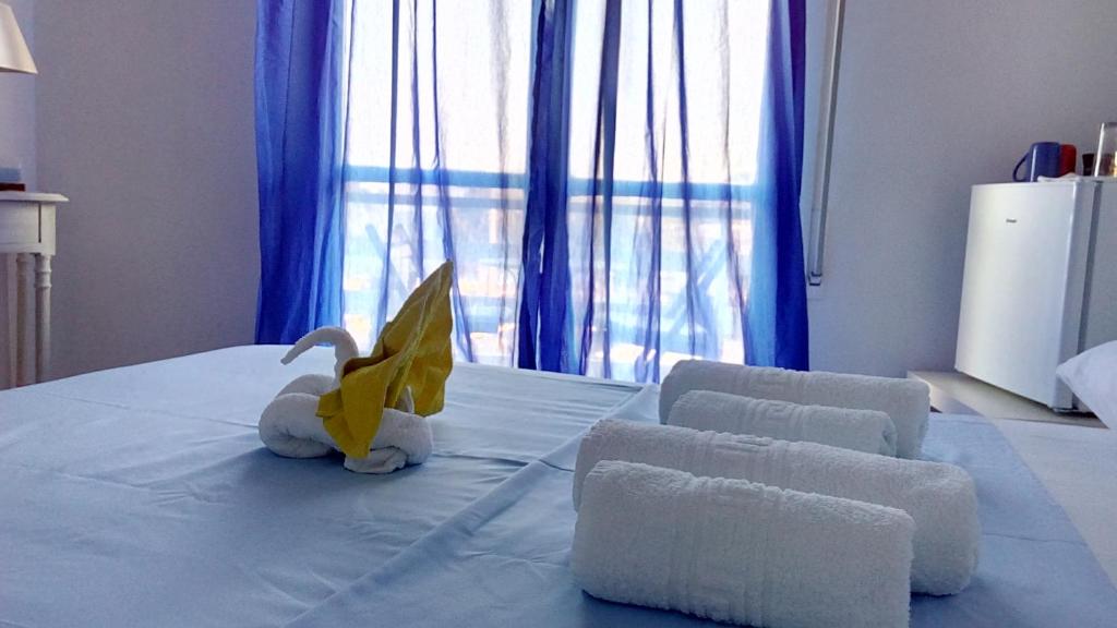 Postel nebo postele na pokoji v ubytování Starfish Vacation Rentals - Athens Int. Airport