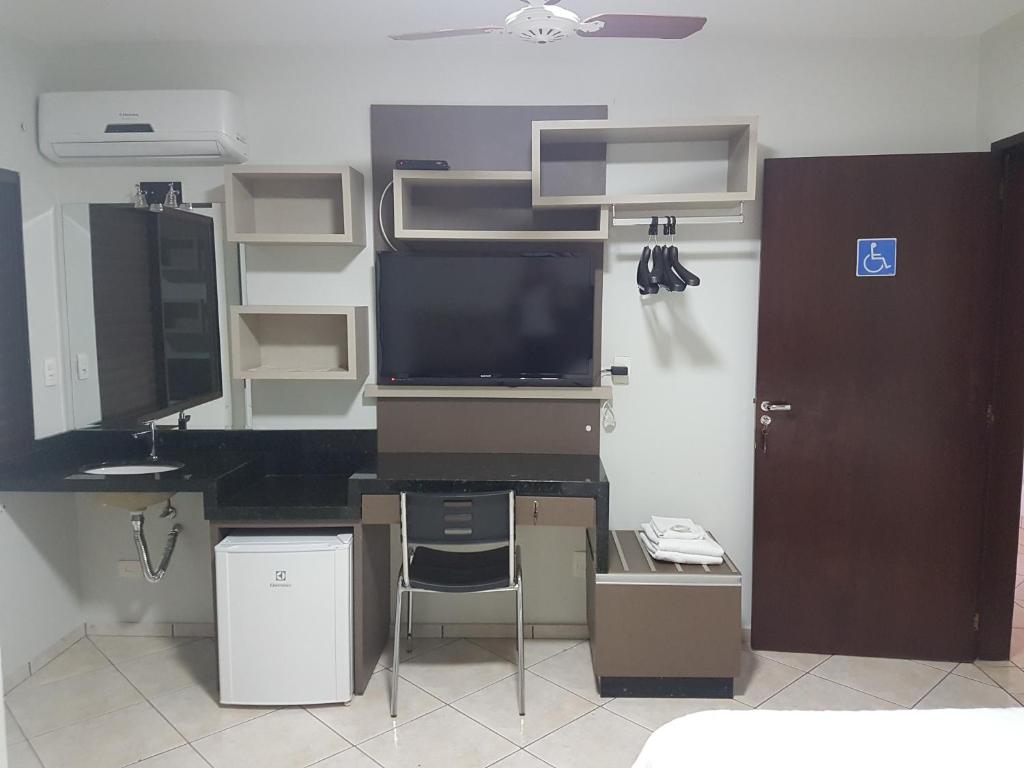 Kuchyň nebo kuchyňský kout v ubytování Hotel Nevada
