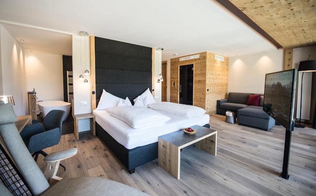 Postel nebo postele na pokoji v ubytování Hotel Kronblick