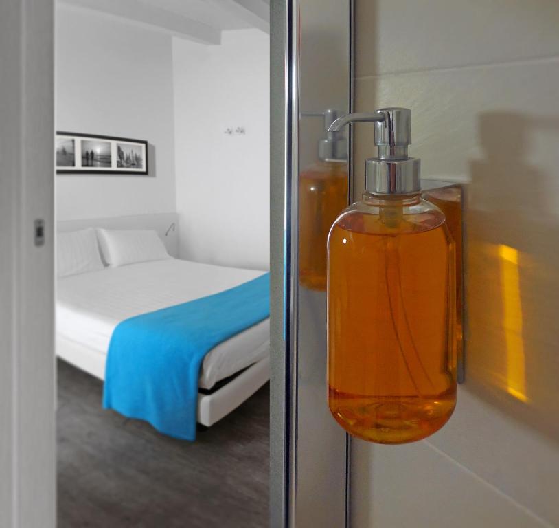 Postel nebo postele na pokoji v ubytování Hotel Europa Monetti
