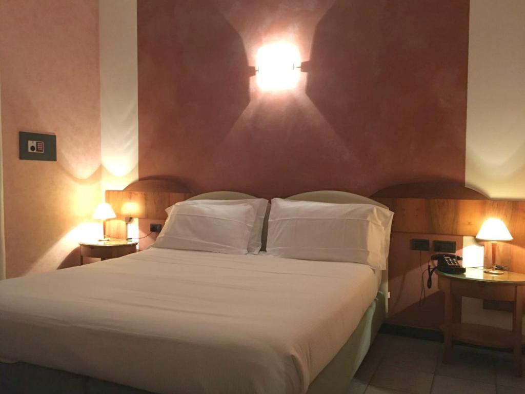 Letto o letti in una camera di Plus Welcome Milano