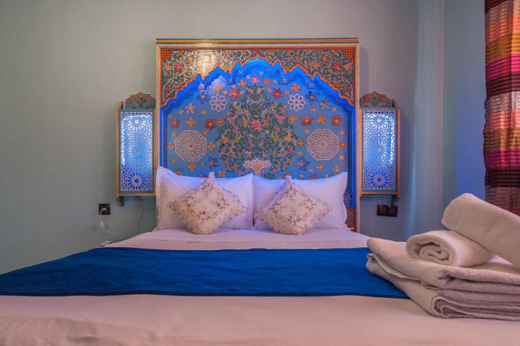 Postel nebo postele na pokoji v ubytování Puerta Azul