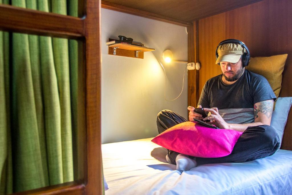 Postel nebo postele na pokoji v ubytování El Patio Hostel Quito