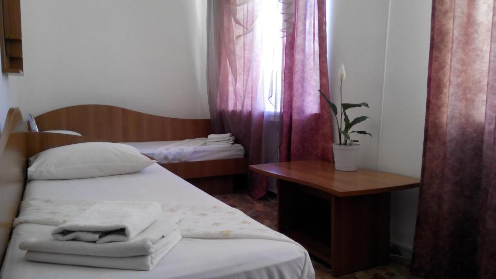 Postel nebo postele na pokoji v ubytování Hotel Avatar