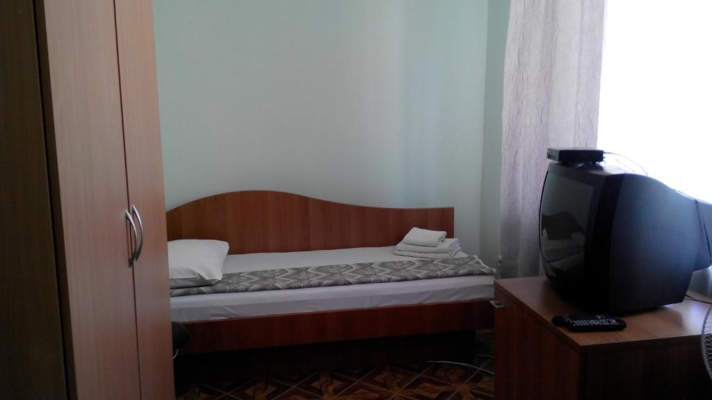 Postel nebo postele na pokoji v ubytování Hotel Avatar
