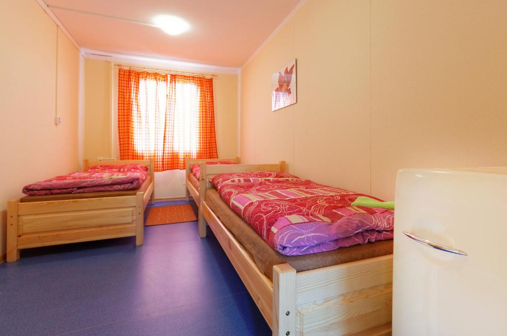 Postel nebo postele na pokoji v ubytování Osada Havranů