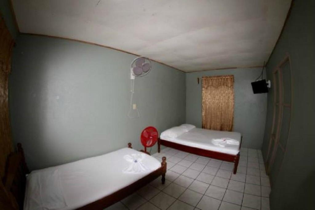 Postel nebo postele na pokoji v ubytování Cabinas Mifran