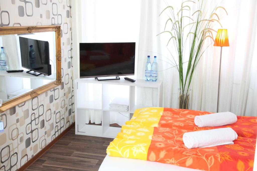 TV a/nebo společenská místnost v ubytování Oase der Ruhe