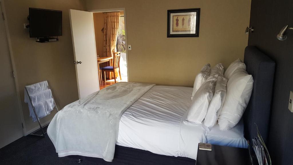Postel nebo postele na pokoji v ubytování Heta Road B&B