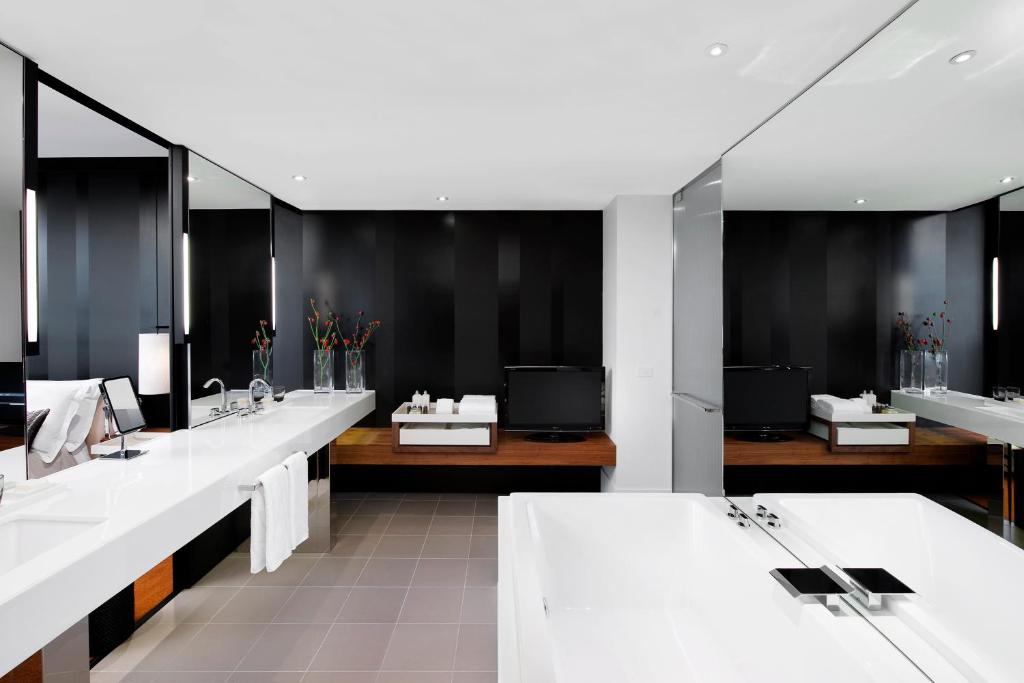 a bathroom with two sinks and two sinksktop at Crown Metropol Melbourne in Melbourne