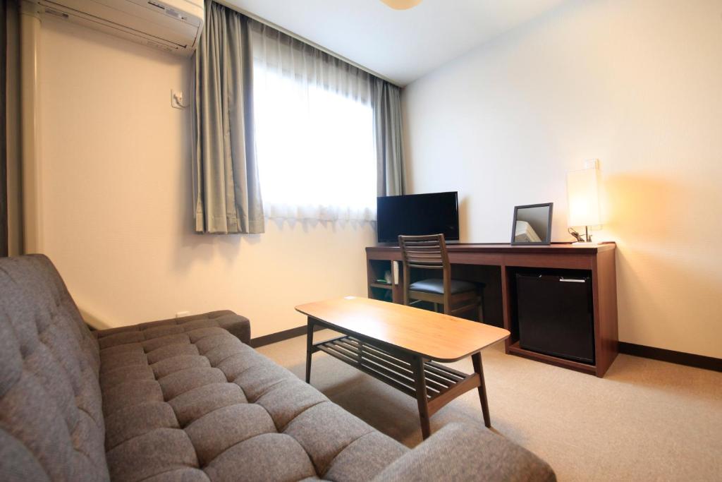 TV a/nebo společenská místnost v ubytování Hotel Togariishi