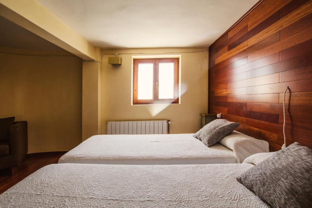 Cama o camas de una habitación en Alojamientos Rurales los Albardinales