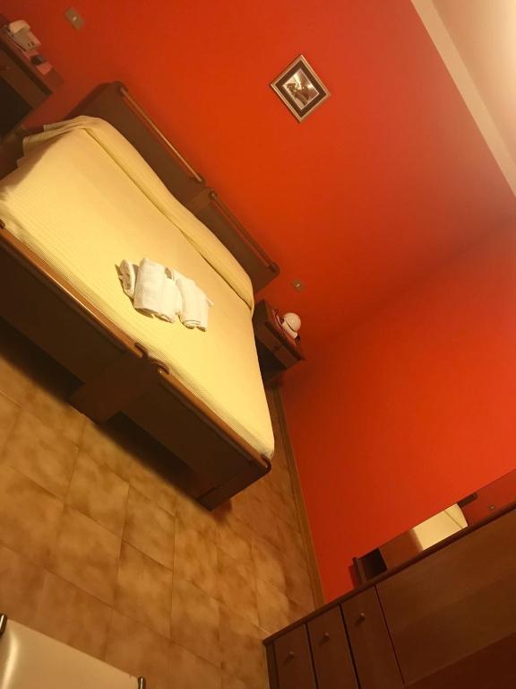 Postel nebo postele na pokoji v ubytování Locanda El Piron
