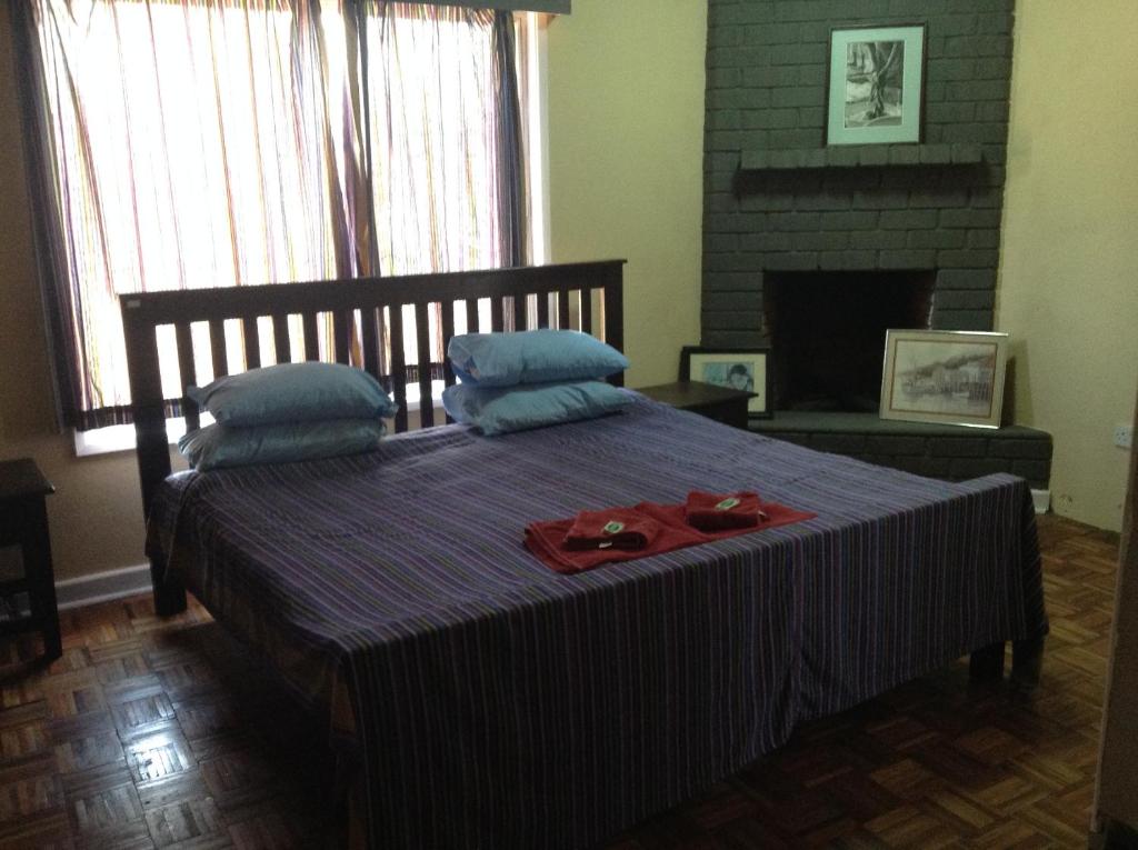 Postel nebo postele na pokoji v ubytování Teule Guest House
