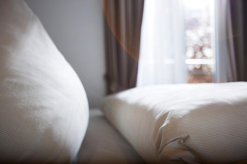 Postel nebo postele na pokoji v ubytování Hotel- Restaurant Poststuben