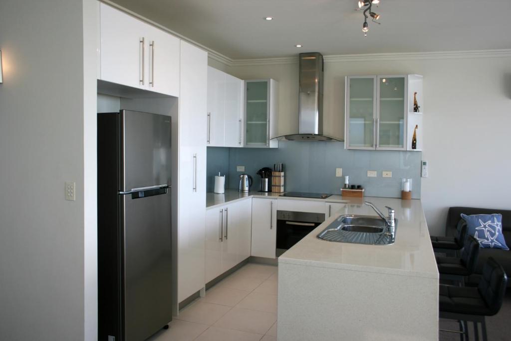 Kuchyň nebo kuchyňský kout v ubytování Penneshaw Oceanview Apartments