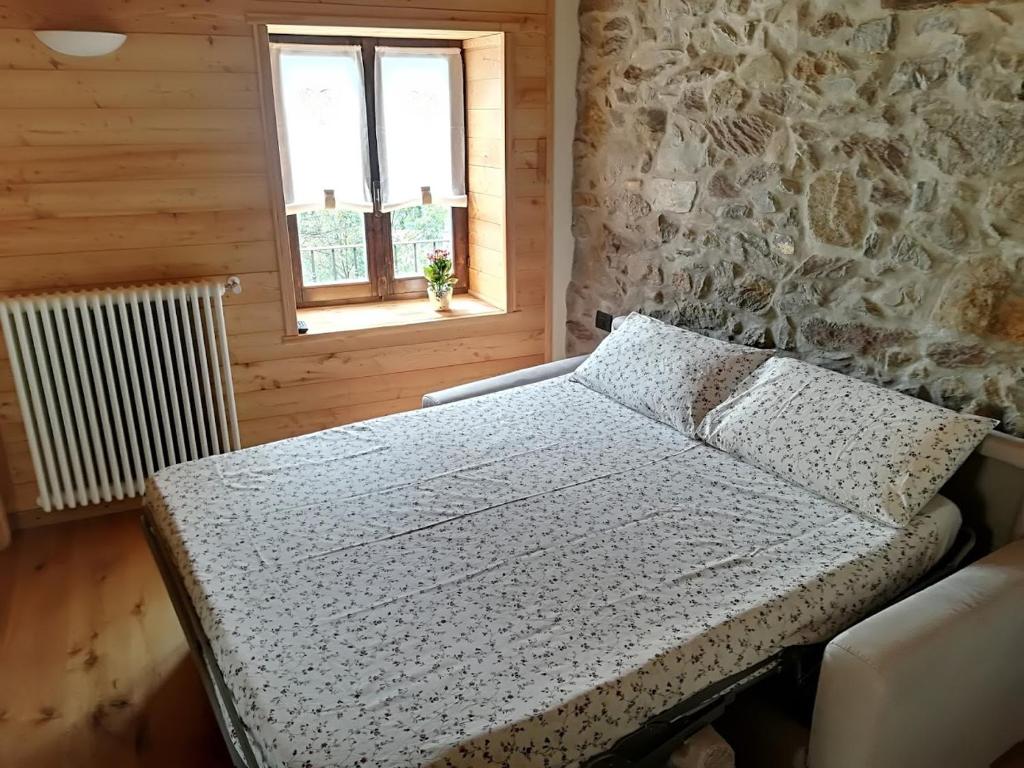 Postel nebo postele na pokoji v ubytování Ai Ruc