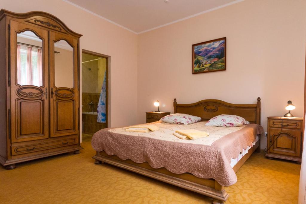 Postel nebo postele na pokoji v ubytování Gortenziya