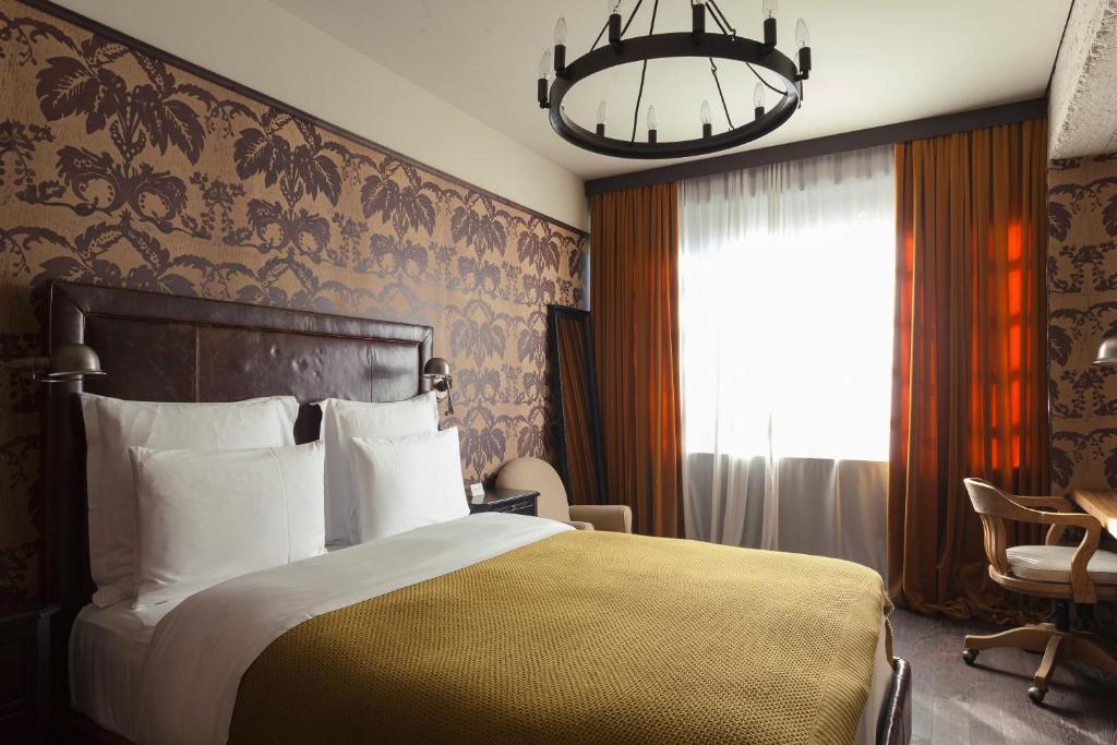 Postel nebo postele na pokoji v ubytování Rooms Hotel Tbilisi