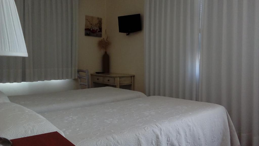 Posteľ alebo postele v izbe v ubytovaní Hotel Valdelinares (Soria)