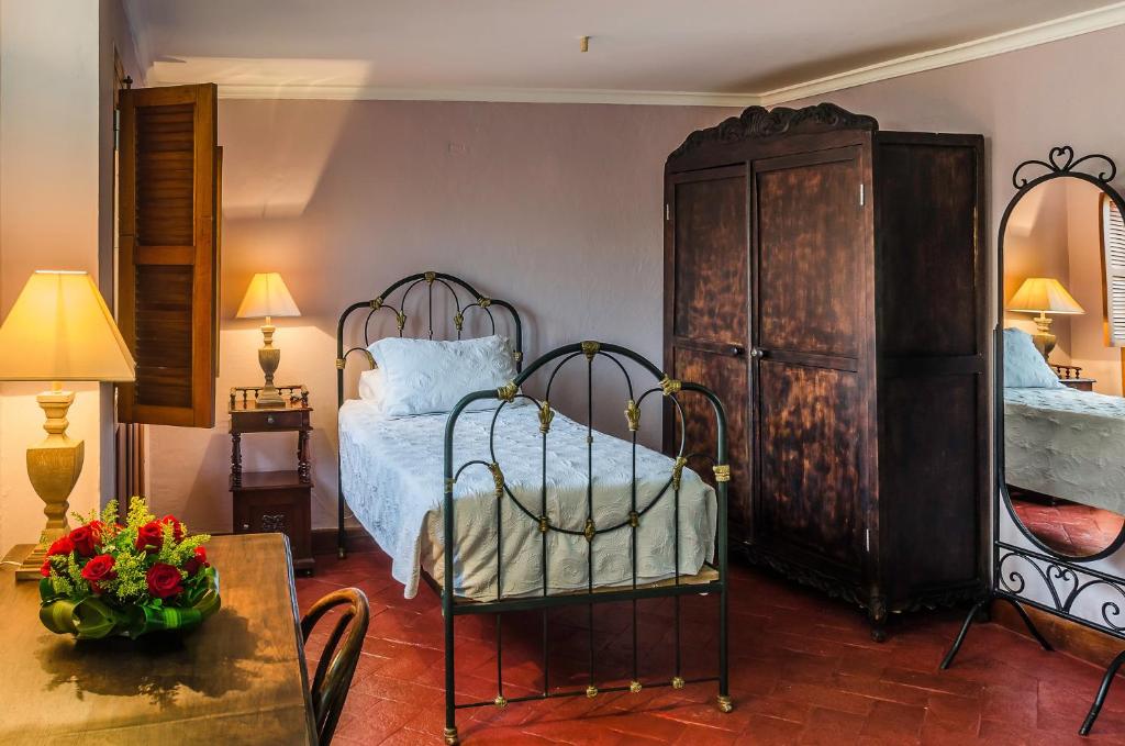 Postel nebo postele na pokoji v ubytování Hotel Boutique Casa Córdoba Estrella