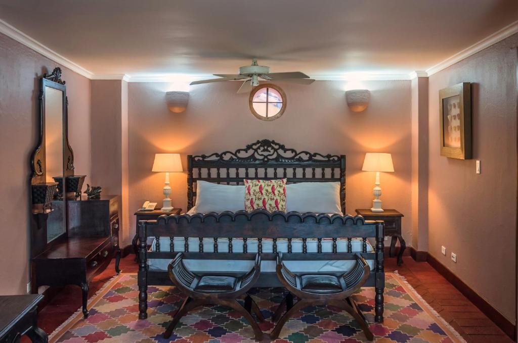 Postel nebo postele na pokoji v ubytování Hotel Boutique Casa Córdoba Estrella