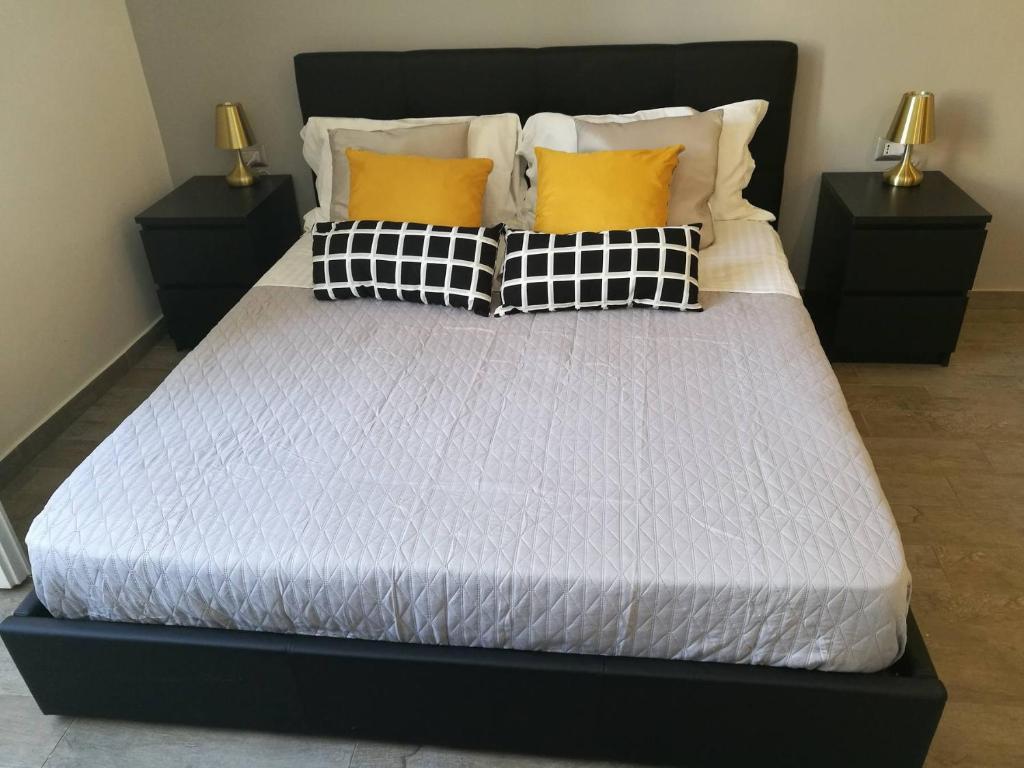 Posteľ alebo postele v izbe v ubytovaní EmyJo Central B&B