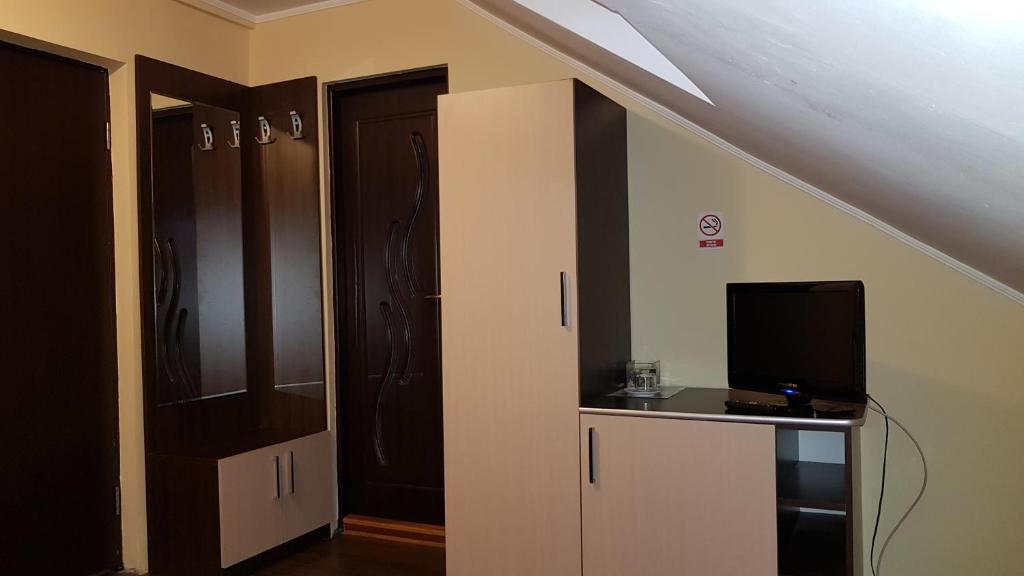 TV a/nebo společenská místnost v ubytování Vila Parc
