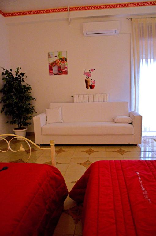 Postel nebo postele na pokoji v ubytování B&B La Felicità