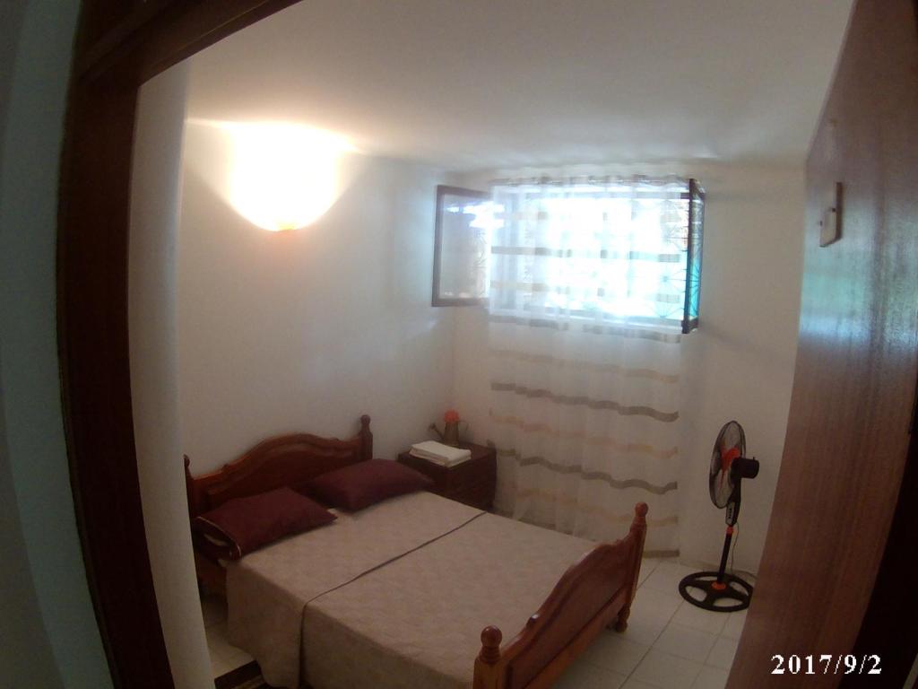Postel nebo postele na pokoji v ubytování Arla Residential