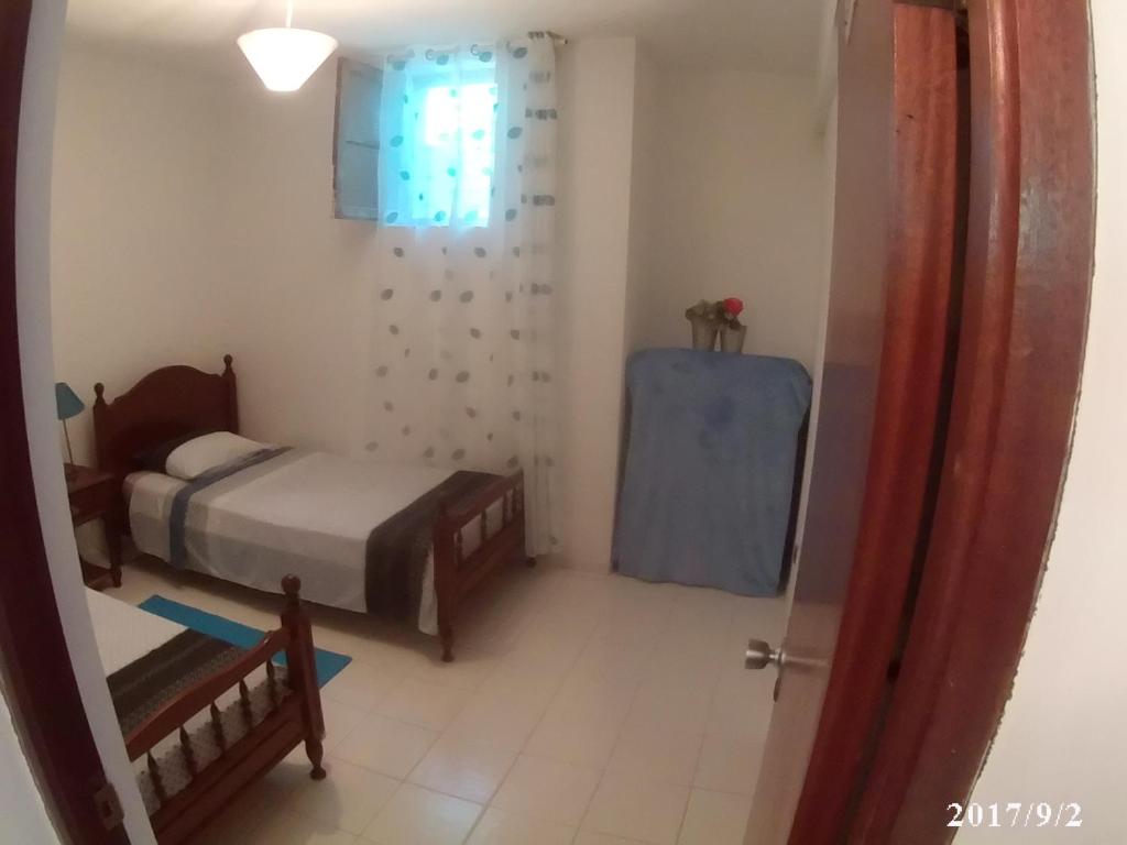Postel nebo postele na pokoji v ubytování Arla Residential