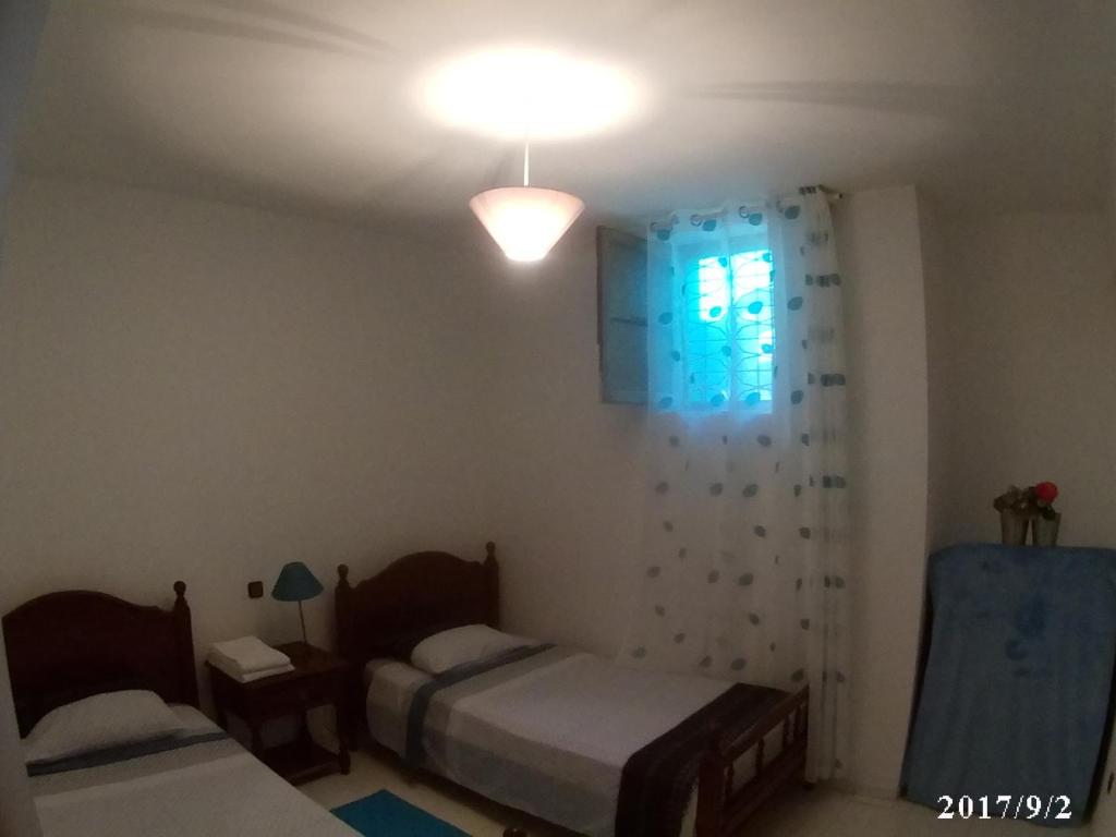 Postel nebo postele na pokoji v ubytování Arla Residential