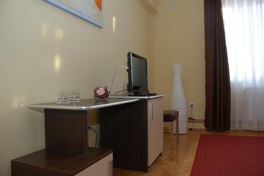 TV a/nebo společenská místnost v ubytování Vila Parc
